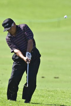 You can clearly see Lee Trevino's firm lead wrist as he chips from the rough.
