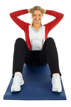 Jupiterimages/Photos.com/Getty Images Change the speed and intensity of calisthenics exercises for the best results.