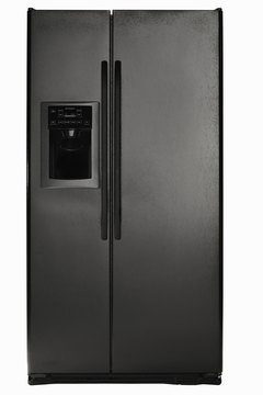 Ryan McVay/Photodisc/Getty Images The magnetic door lock on your refrigerator is a dangerous spot for credit cards.