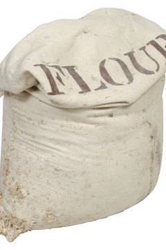Hemera Technologies/PhotoObjects.net/Getty Images Flour is a key ingredient in dog biscuits.