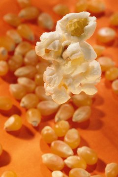 Jupiterimages/Photos.com/Getty Images A natural whole-grain snack, popcorn provides fiber, vitamins and antioxidants.