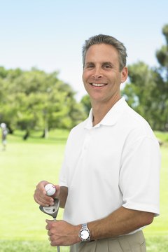 Siri Stafford/Digital Vision/Getty Images Assistant golf professionals help with all aspects of running the course.
