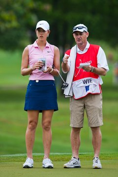 Professional golfers and caddies use detailed yardage books.