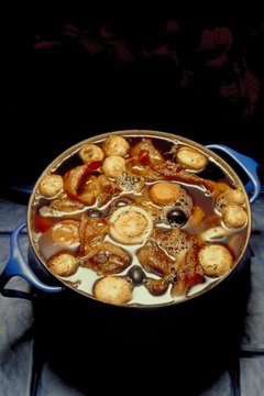 Jupiterimages/Photos.com/Getty Images Use a long, slow cooking method to tenderize beef tongue.