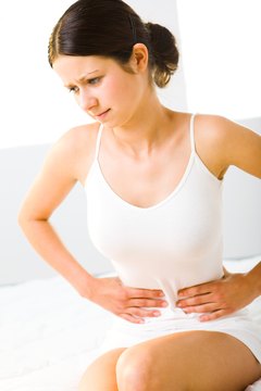 Jupiterimages/Photos.com/Getty Images Learning to prevent and manage stomach woes is part of complete marathon prep.