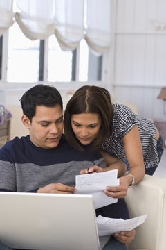 Comstock Images/Comstock/Getty Images Comparing rates from lenders helps you decide on a loan.