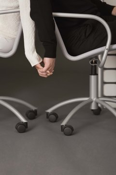 Jupiterimages/Comstock/Getty Images Office romances are among some of the controversial issues you may face in the workplace.