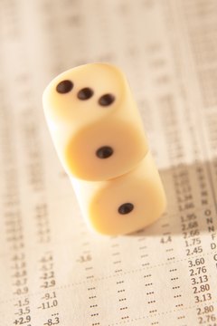 Hemera Technologies/Photos.com/Getty Images Buying a stock with a "Q" after its listing is a real gamble.
