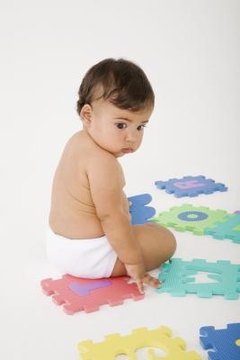 Babies begin learning grammar while learning to talk.