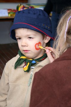 Face painting is a popular activity at school carnivals