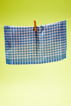 Use a handkerchief as a mouth gag.