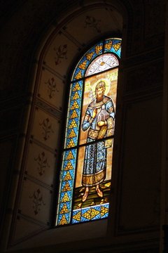 Stained glass windows can depict religious figures.