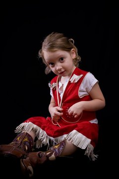 Little girl dressed as a cowgirl