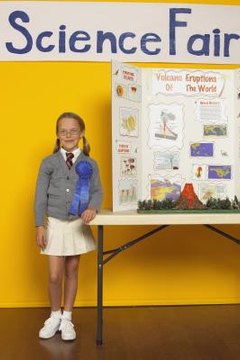 Communicate your results with a display board and a model or props.