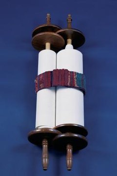 Wrapping the scroll in a large rubber band is also effective for this step.