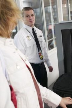 Woman going through security at airport