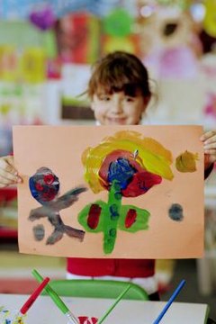 Little girl with painting