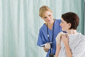 Nurse injecting patient with syringe