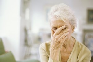 close-up of a senior woman with her eyes closed