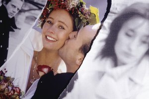 Groom kissing bride (colour), woman looking down on right (B&W), man on left (B&W), digital composite