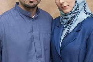 Turkish man wearing thobe and Iranian Persian woman wearing hijab headscarf