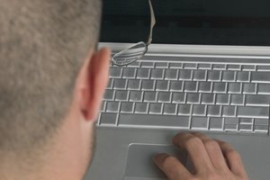 Man typing on laptop