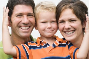 Cute portrait of son with parents