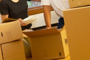 Couple with moving boxes