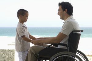 Man in wheelchair with son