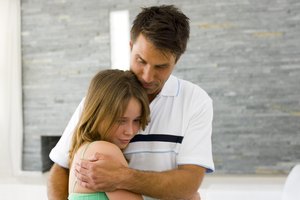 Father hugging his daughter