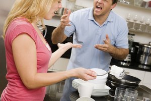 Couple arguing in kitchen