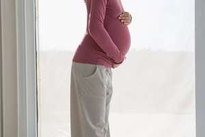 Pregnant woman on scale