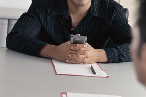 Professional man sitting at a table