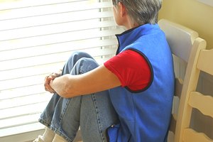 Woman looking out window