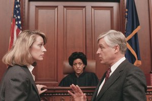 Judge and lawyers in courtroom