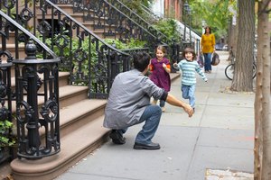 Children running to waiting father, Manhattan, New York City