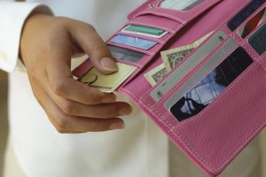 Hands holding woman's wallet
