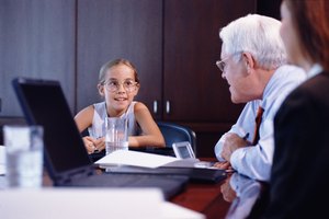 Girl leading business meeting