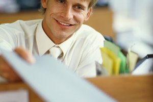 businessman receiving a file in an office