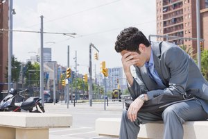 Upset man sitting