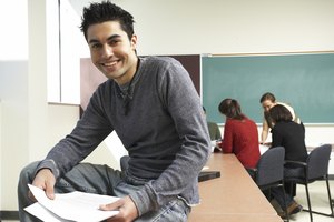 Smiling college student posing in classroom