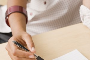 Businesswoman writing