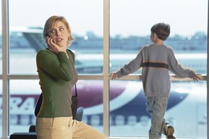 Mother and son at airport