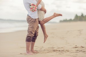 Bride and groom on the beach