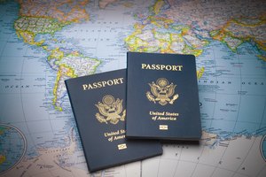 Passports on a map of the world