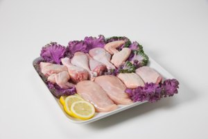 Cómo cocinar piernas y pechugas de pollo en el horno