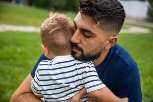 Father Consoling His Toddler