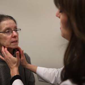 Doctor examining patient