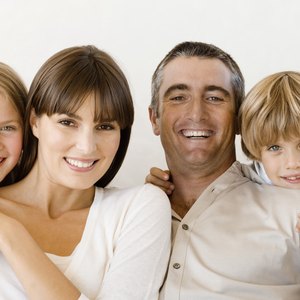 Smiling family with children.