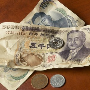Coins and paper Yen from Japan.